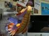 An augmented image of a dragon flying out of a whole in the wall of my office!